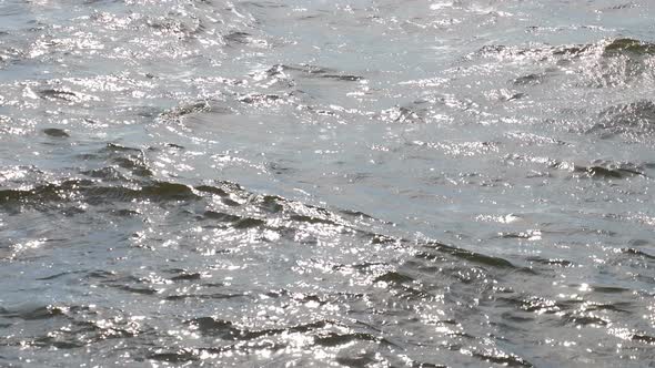 River Waves From Passing Ship Nearby