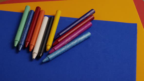 Rotating shot of color wax crayons for drawing and crafts - CRAYONS 019
