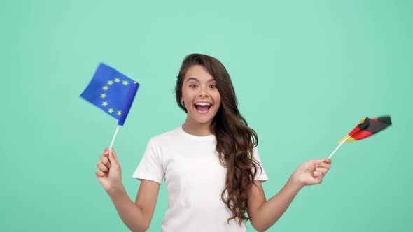 Surprised Happy Child Waving European Union and German Flag Feeling Amazement Schengen Visa