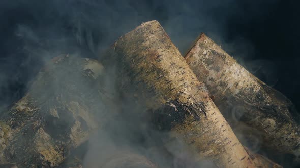 Smoking Camp Fire