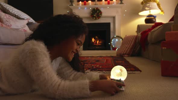 Girl at home at Christmas time