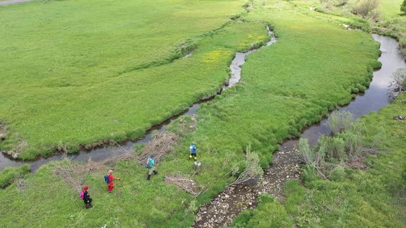 Trekking By The Creek In Aerial View 4