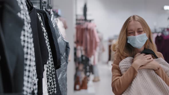 Happy Funny Satisfied Caucasian Lady Woman Girl Shopper Wears Medical Protective Mask in Clothing