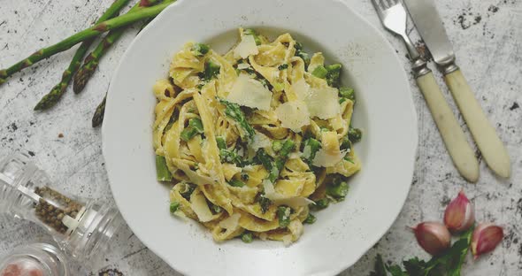 Tagliatelle Pasta with Creamy Ricotta Cheese Sauce and Asparagus Served White Ceramic Plate