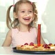 Little Girl Laughs Smiles and Looks at Burning Fireworks in Cake - VideoHive Item for Sale