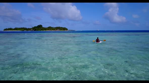 Aerial seascape of perfect island beach adventure by blue ocean and white sand background of a daytr