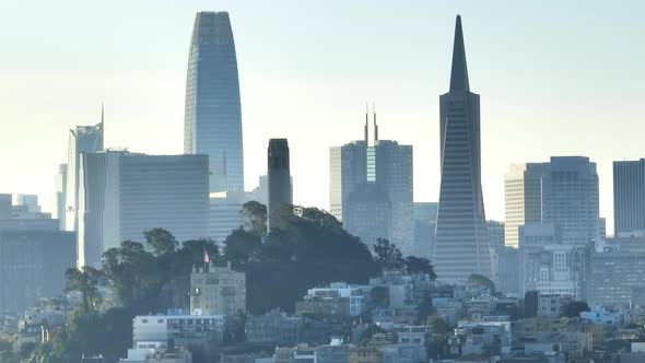 Vibrant Architecture of Skyscrapers Covered with Misty Skyline in the Morning alt