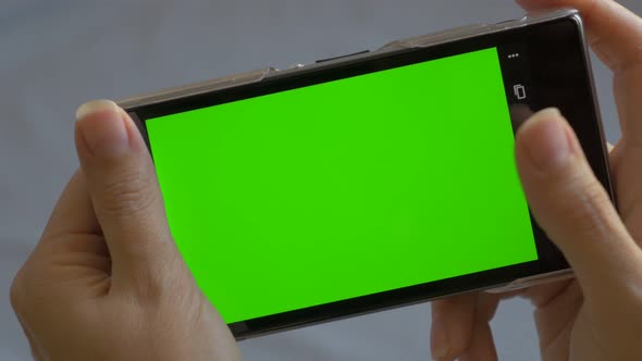 Mobile phone green screen in 4K UHD 2160p footage - Smart phone using green screen 4K 3840X2160 UHD 