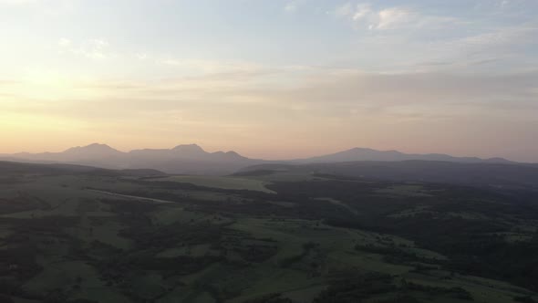Beautiful sunset colors over the mountain ranges in Eastern Serbia 4K drone footage