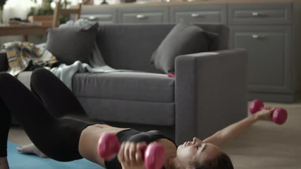 Slim Woman Doing Exercise At Home