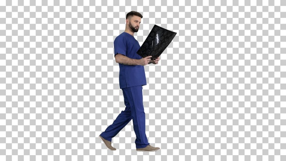 Surgeon studying mri brain scan while walking, Alpha Channel