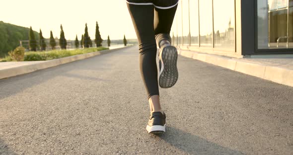 Young Black Woman Runner Outdoor Jogging at Dawn