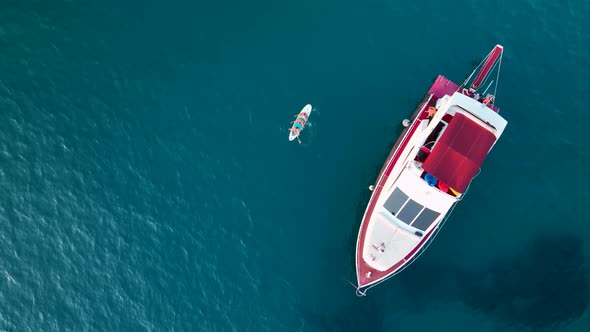 A Large Yacht Stands at Sea Aerial View 4 K