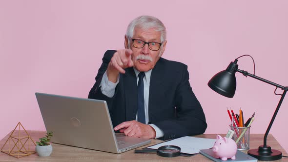 Senior Businessman Smiling Pointing to Camera Choosing Lucky Winner Indicating to Awesome you