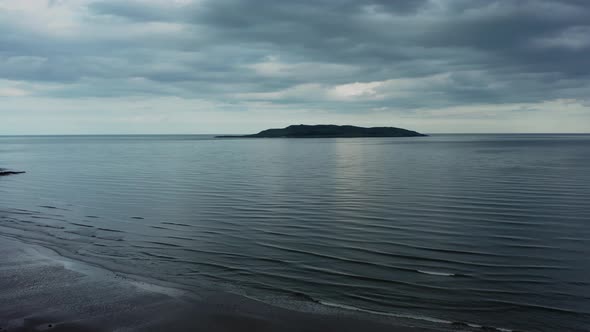 Irish sea and Lambay Island on a cloudy evening