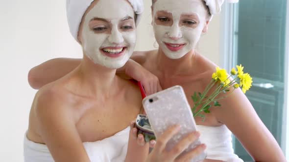 Beautiful Woman Having a Facial Treatment at Spa