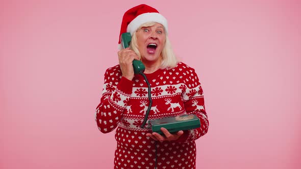 Mature Christmas Grandmother Woman Talking on Wired Vintage Telephone of 80s Hey you Call Me Back