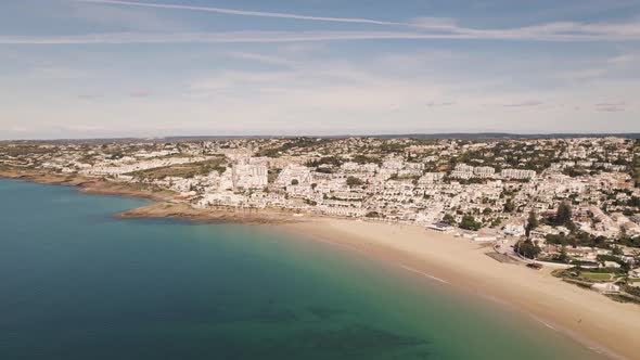 Idyllic scenery of Praia da Luz in Algarve Coastline, near Lagos - Aerial wide