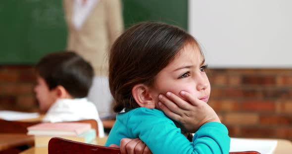 Little Girl Thinking Hard During Class