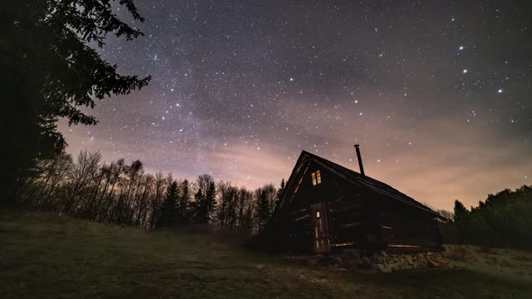 Magic Night with Stars Milky Way Galaxy above Old Wooden Hut