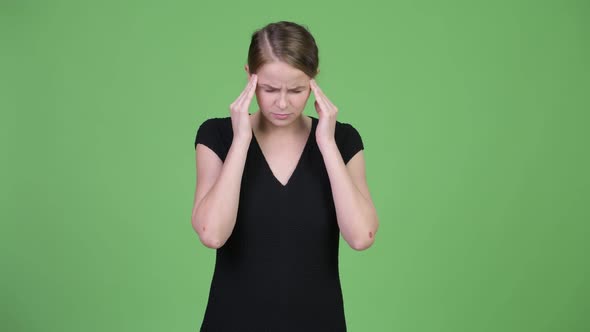 Young Stressed Businesswoman Having Headache