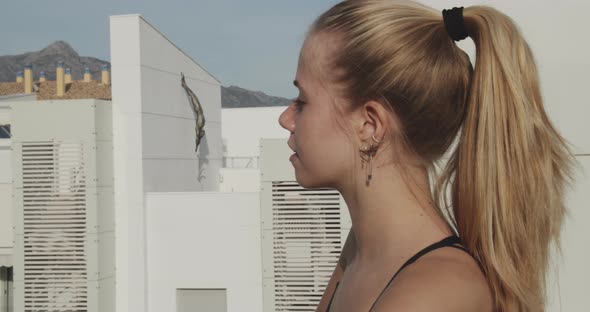 Panning Shot Of A Young Lady With Pierced Ears