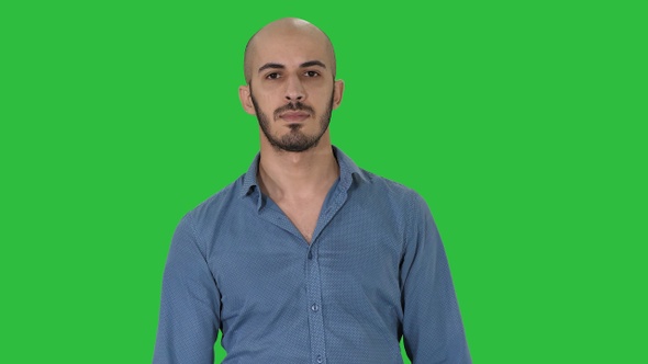 Attractive arab model walking on a Green Screen, Chroma Key