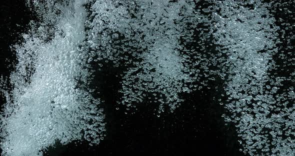 900443 Bubbles of Air in the Water on Black Background, Slow Motion 4K