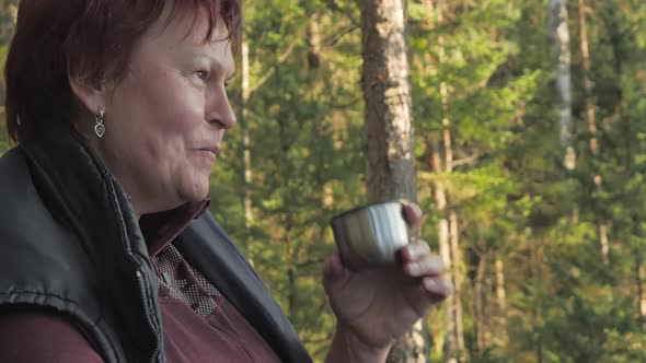 Closer Look of the Lady Sipping Her Hot Tea in Espoo Finland