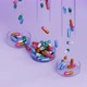 Capsule pills falling from test tubes to Petri dish, healthcare medical concept - VideoHive Item for Sale