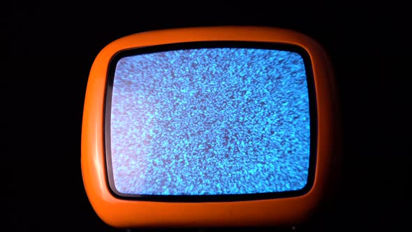 Power On Vintage TV With Gray UHF Noise on the Cathode Ray Tube Screen Close Up