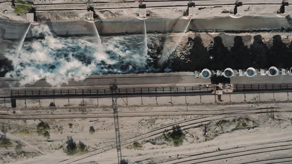 Aerial view; drone moving over the production sity of steel plant