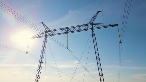 Steel Pillar with High Voltage Electric Power Lines Delivering Electrical Energy Through Cable Wires