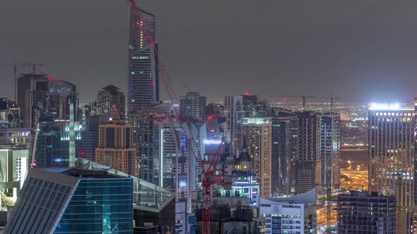 Dubai Marina Skyscrapers and Jumeirah Lake Towers View From the Top Aerial Night Timelapse in the