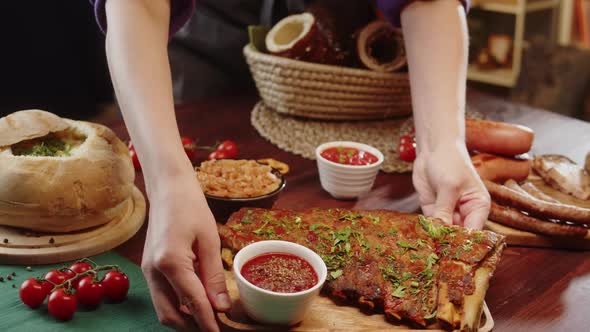 Putting Smoked Ribs with Sauce