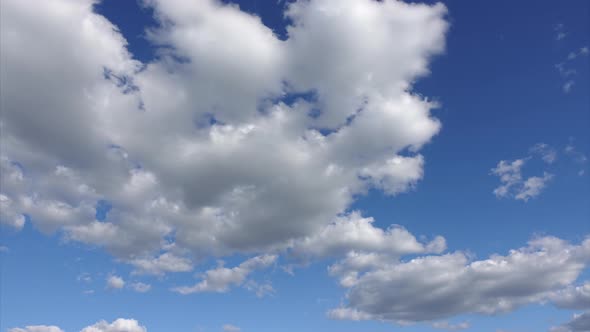 Time Lapse of Clouds at Blue Sky Background. Beautiful White Clouds in a Clean Atmosphere