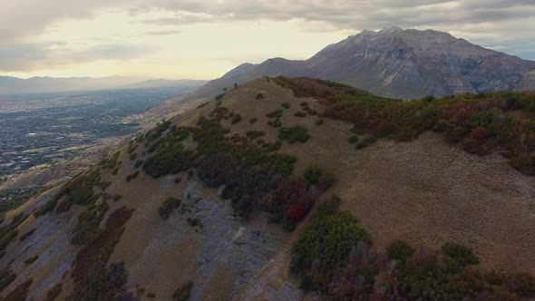 Aerial view on hillside above city during Fall.