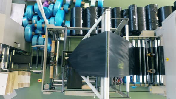 Top View of a Conveyor Machine Producing Polyethylene