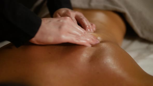 Traditional Oriental Aroma Therapy. Woman Relaxing in Spa Salon, Close Up Macro Massage Professional