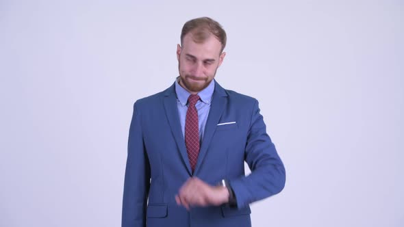 Stressed Bearded Businessman Looking Bored and Tired