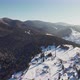 Mountains Covered with Snow and a Village on a Hill - VideoHive Item for Sale