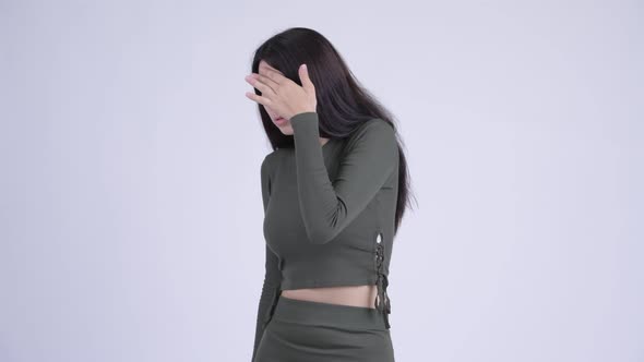 Young Stressed Woman Covering Eyes Not Wanting To See Something
