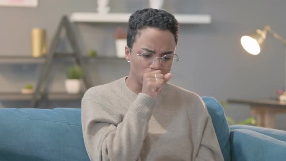 Portrait of Sick African Woman Coughing