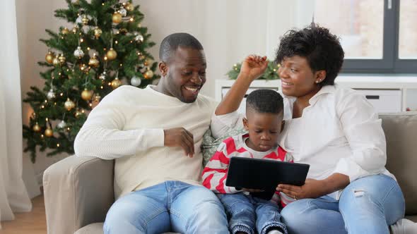African Family with Tablet Pc on Christmas