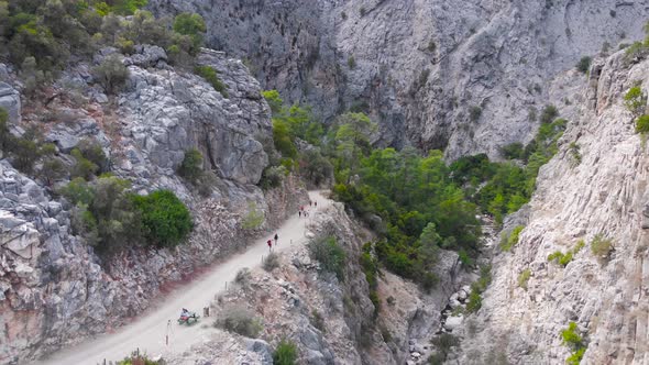 Flying Among Rocky Mountains in a Deep Prehistoric Gorge