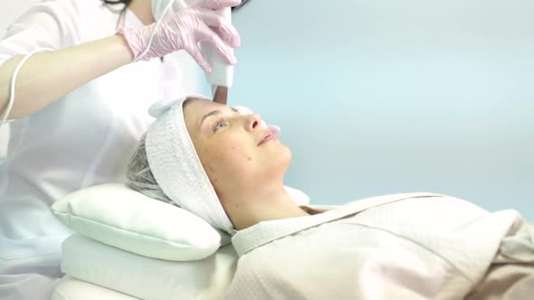 Young and Beautiful Girl in the Clinic of Natural Beauty