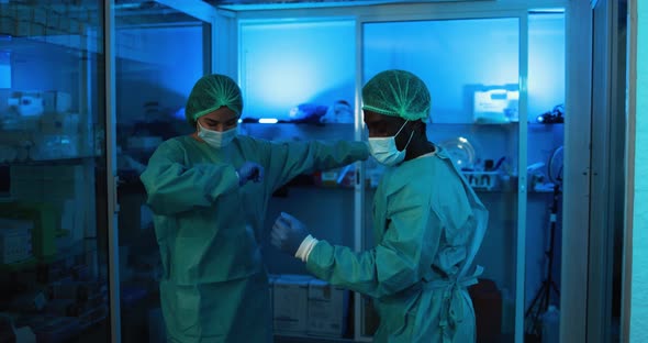 Doctors and nurse dancing in hospital during coronavirus pandemic outbreak