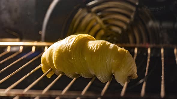 Butter Dripping From Croissant Bread Baking In The Oven. - hyperlapse