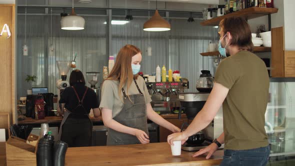 Barista Medical Face Mask in Coffee Shop Lockdown Quarantine Coronavirus is Over Back to Normal