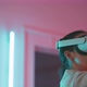 Camera moves showing young woman with her hands up in vr goggles - VideoHive Item for Sale